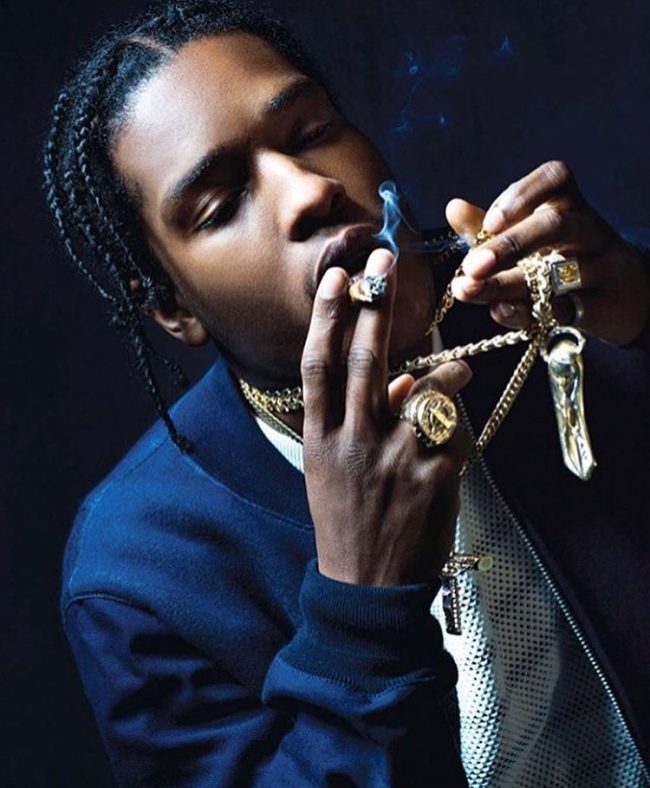ASAP Rocky smoking and wearing gold jewelry